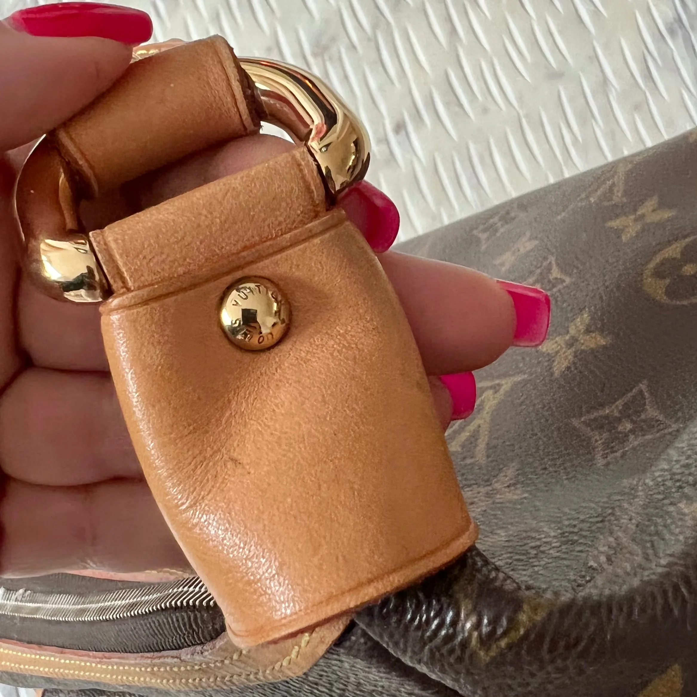 Louis Vuitton Tikal Bag